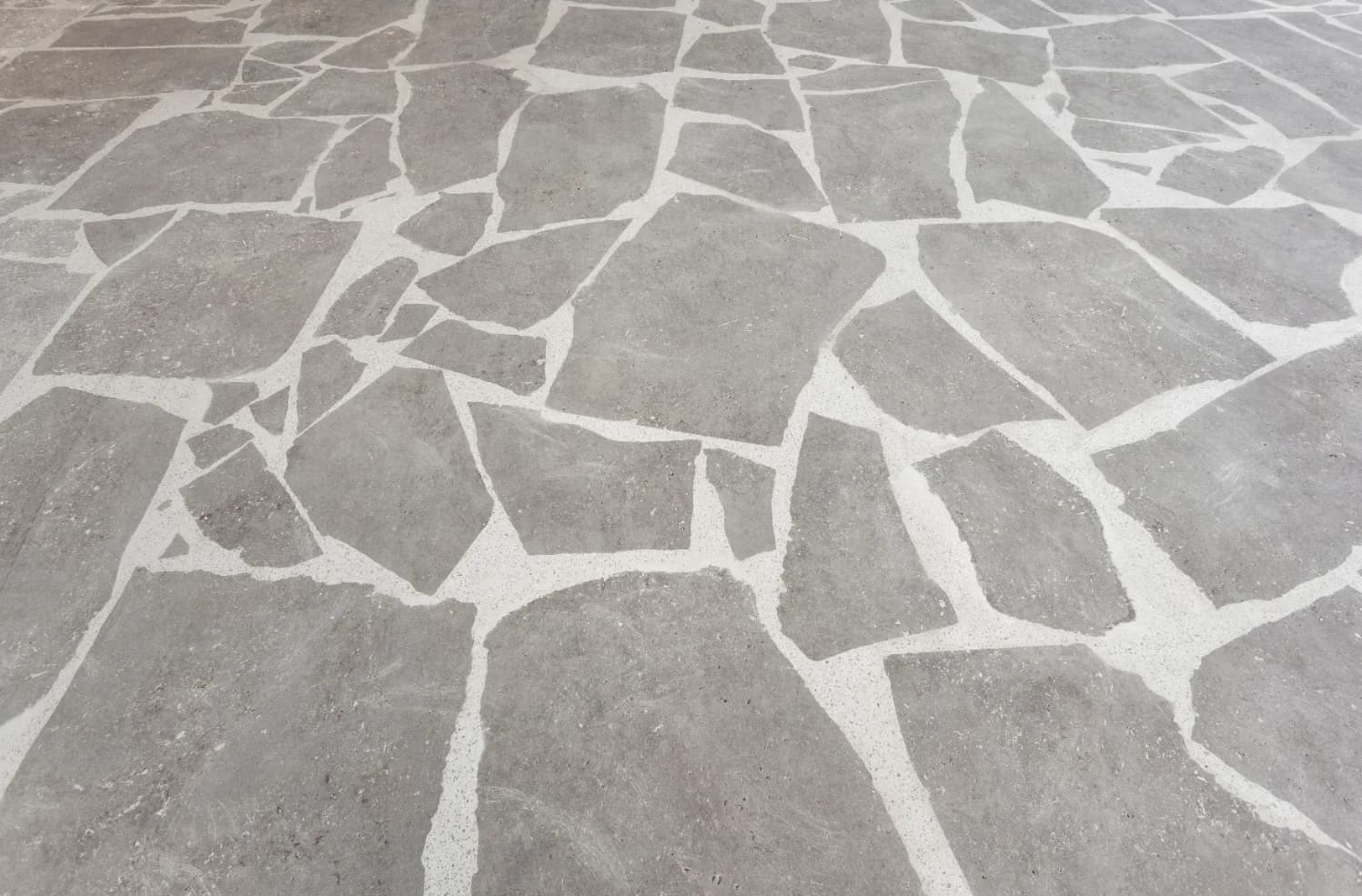 A natural stone floor cleaned by Fresher Pressure