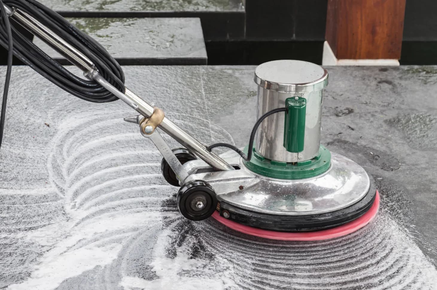 A stone floor surface being polished by Fresher Pressure